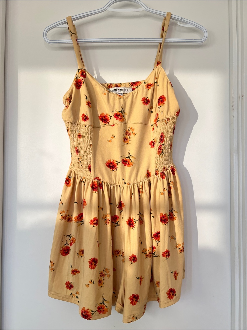 Urban outfitters Yellow Floral Smocked Romper with Red Blooms